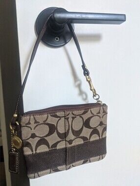 COACH Signature Canvas Wristlet in Brown and Tan